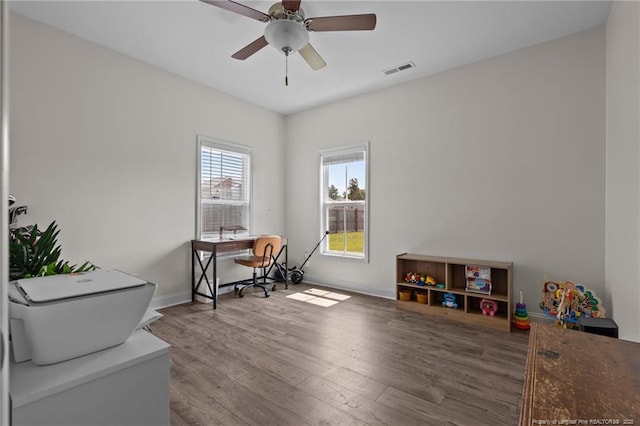 117 Titleist Ct, Raeford, NC 28376 - home office featuring wood finished floors, ceiling fan, and baseboards