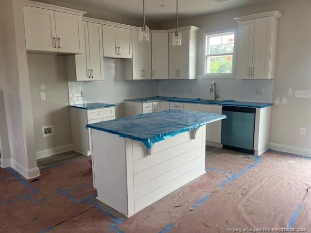 1036 Turlington Rd, Dunn, NC 28334 - kitchen featuring dishwasher, a center island, tasteful backsplash, and a sink