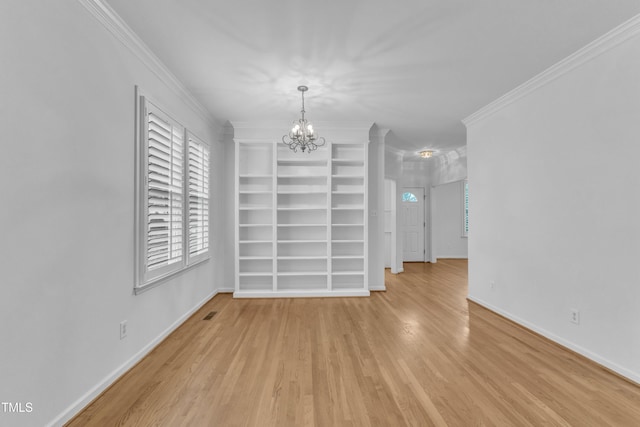 500 Center Pointe Dr, Cary, NC 27513 - unfurnished dining area featuring wood finished floors, a chandelier, baseboards, ornamental molding, and built in features