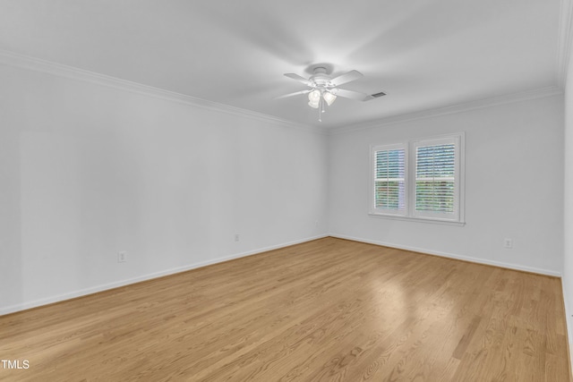 500 Center Pointe Dr, Cary, NC 27513 - spare room with a ceiling fan, crown molding, light wood-style flooring, and baseboards