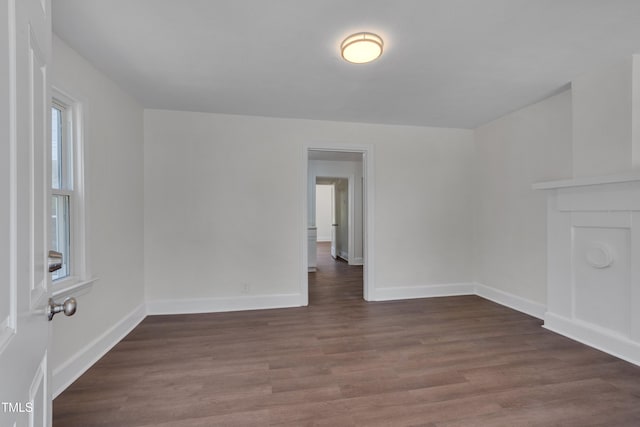 414 Craven St, Durham, NC 27704 - unfurnished room with dark wood-type flooring and baseboards