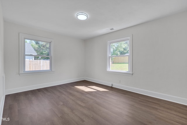 414 Craven St, Durham, NC 27704 - unfurnished room featuring dark wood-style floors and baseboards