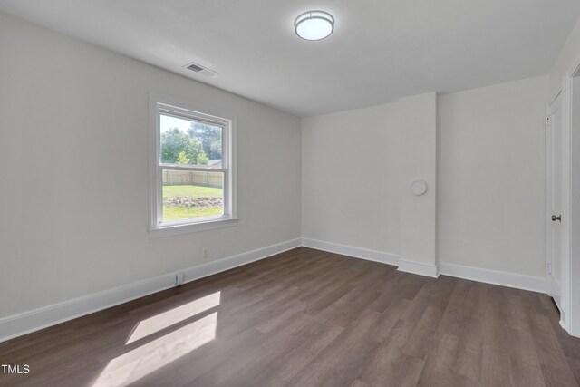 414 Craven St, Durham, NC 27704 - empty room featuring wood finished floors and baseboards