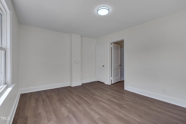 414 Craven St, Durham, NC 27704 - spare room with wood finished floors and baseboards