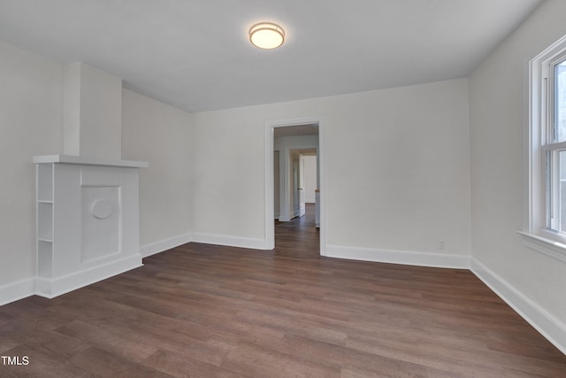 414 Craven St, Durham, NC 27704 - spare room featuring wood finished floors and baseboards