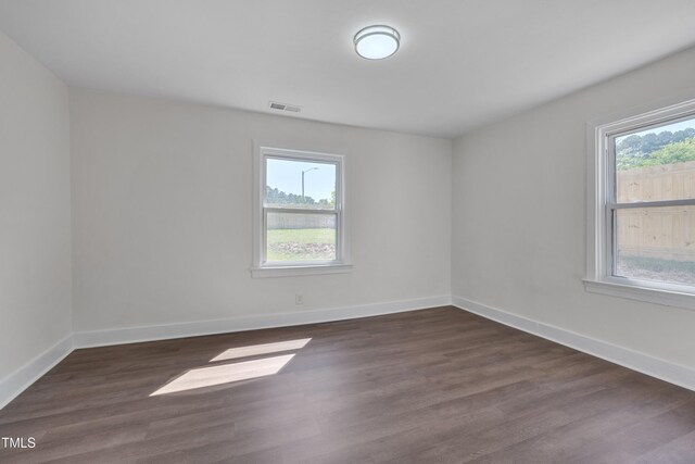 414 Craven St, Durham, NC 27704 - unfurnished room featuring plenty of natural light and dark wood finished floors