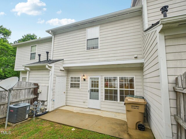 2845 Bennington Dr, Clayton, NC 27520 - rear view of house featuring central AC unit and a patio