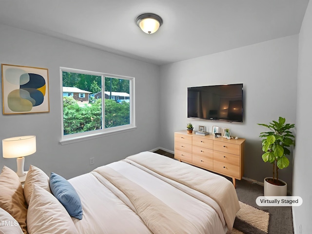 916 Waring St, Durham, NC 27704 - bedroom with baseboards and carpet flooring