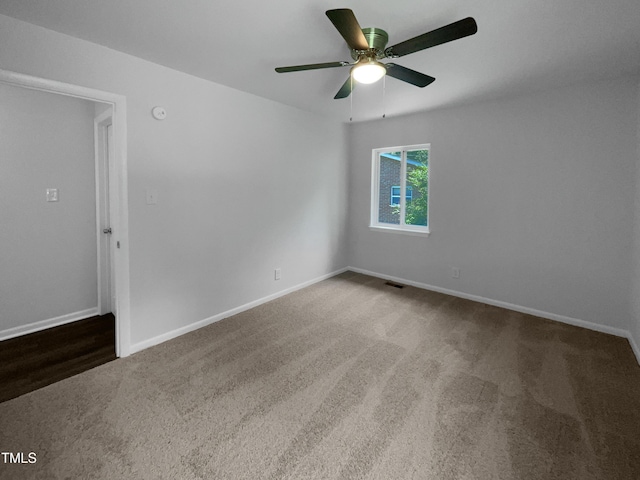 916 Waring St, Durham, NC 27704 - spare room with carpet flooring, a ceiling fan, and baseboards