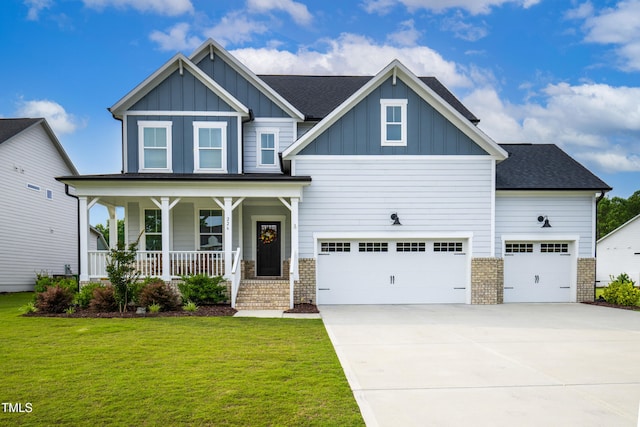 226 Castle Pond Way, Fuquay Varina, NC 27526 - craftsman inspired home featuring board and batten siding, covered porch, driveway, a front yard, and an attached garage