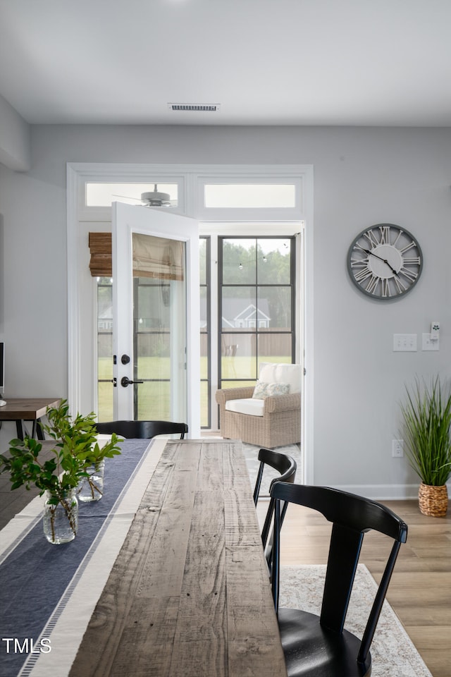 226 Castle Pond Way, Fuquay Varina, NC 27526 - dining space with french doors and wood finished floors