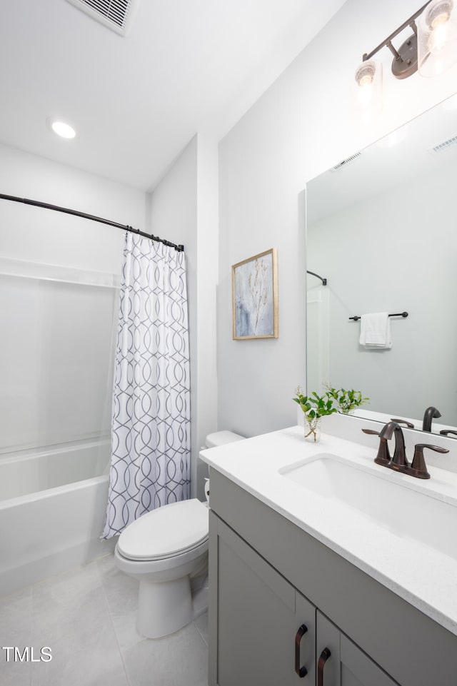 226 Castle Pond Way, Fuquay Varina, NC 27526 - bathroom with vanity, shower / bathtub combination with curtain, and tile patterned flooring
