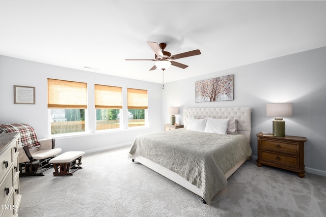 226 Castle Pond Way, Fuquay Varina, NC 27526 - carpeted bedroom with baseboards and a ceiling fan