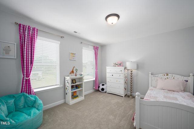 226 Castle Pond Way, Fuquay Varina, NC 27526 - bedroom featuring multiple windows and carpet