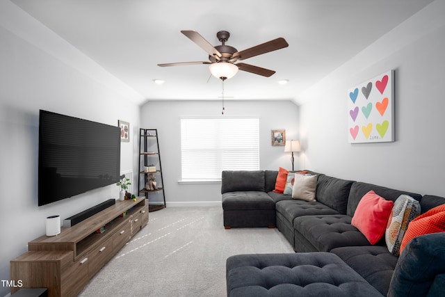 226 Castle Pond Way, Fuquay Varina, NC 27526 - carpeted living area with ceiling fan and lofted ceiling
