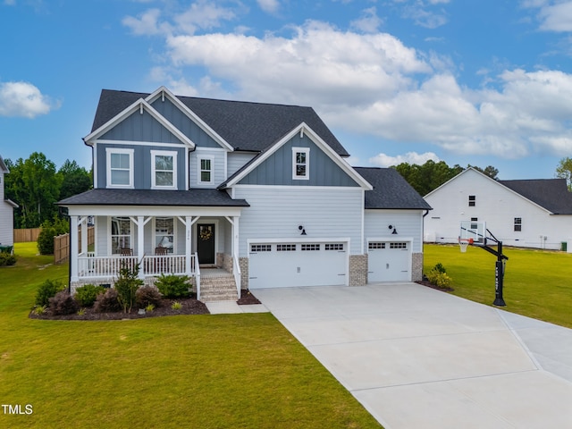 226 Castle Pond Way, Fuquay Varina, NC 27526 - craftsman house with board and batten siding, a porch, driveway, a front yard, and a shingled roof