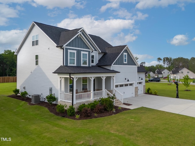 226 Castle Pond Way, Fuquay Varina, NC 27526 - view of front of property featuring a porch, board and batten siding, driveway, a front yard, and roof with shingles