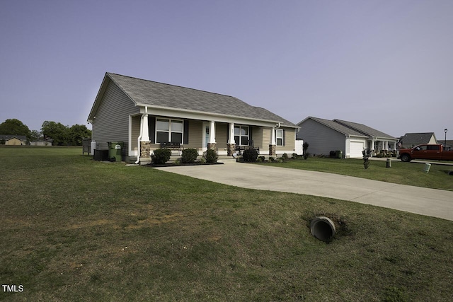 60 Falling Leaf Ln, Benson, NC 27504 - view of front facade with covered porch, a front yard, central AC, and a shingled roof