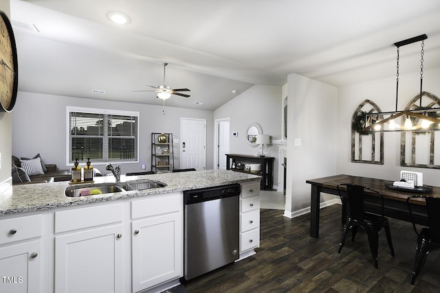 60 Falling Leaf Ln, Benson, NC 27504 - kitchen with stainless steel dishwasher, a sink, lofted ceiling, a ceiling fan, and light stone counters