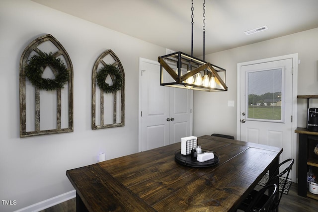 60 Falling Leaf Ln, Benson, NC 27504 - dining space featuring dark wood-style floors and baseboards
