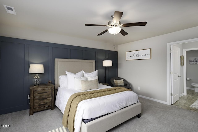 60 Falling Leaf Ln, Benson, NC 27504 - bedroom featuring light colored carpet, ceiling fan, and connected bathroom