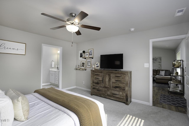 60 Falling Leaf Ln, Benson, NC 27504 - bedroom with carpet flooring, baseboards, a ceiling fan, and ensuite bathroom