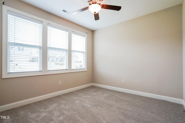 67 Bornean Dr, Garner, NC 27529 - unfurnished room featuring carpet flooring, ceiling fan, and baseboards