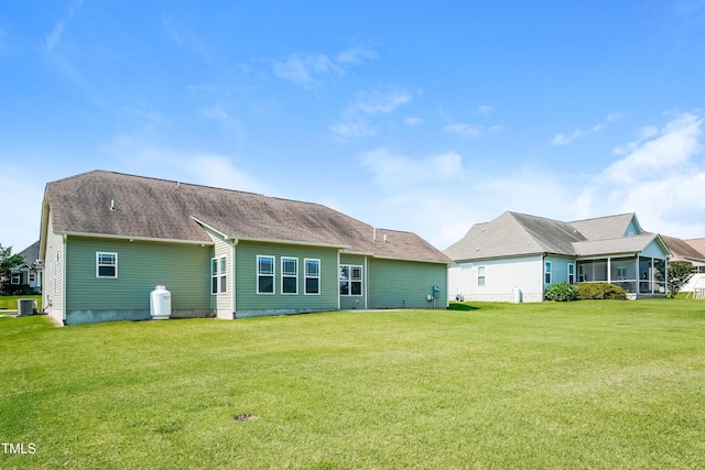 67 Bornean Dr, Garner, NC 27529 - rear view of house with cooling unit and a yard