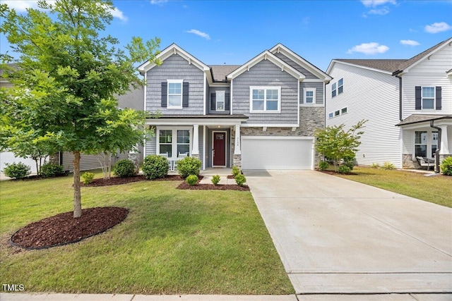 4508 Valley Crest Ln, Fuquay Varina, NC 27526 - craftsman house featuring stone siding, concrete driveway, an attached garage, and a front yard