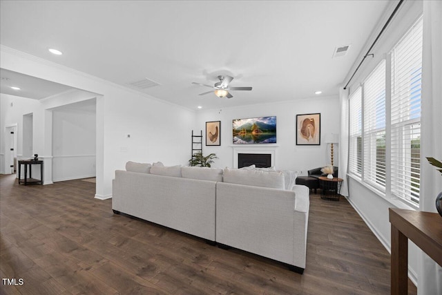 4508 Valley Crest Ln, Fuquay Varina, NC 27526 - living area featuring recessed lighting, ceiling fan, a fireplace, dark wood-style flooring, and ornamental molding