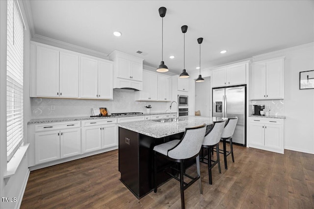 4508 Valley Crest Ln, Fuquay Varina, NC 27526 - kitchen with appliances with stainless steel finishes, a sink, backsplash, white cabinetry, and recessed lighting