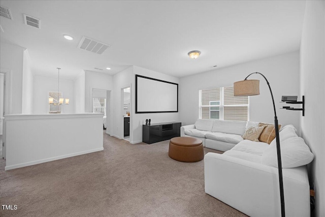 4508 Valley Crest Ln, Fuquay Varina, NC 27526 - cinema with healthy amount of natural light, a chandelier, carpet flooring, recessed lighting, and baseboards