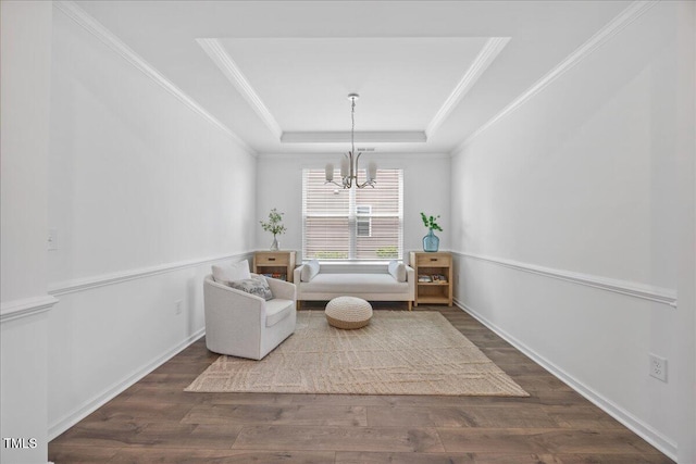 4508 Valley Crest Ln, Fuquay Varina, NC 27526 - sitting room featuring a chandelier, wood finished floors, a raised ceiling, crown molding, and baseboards