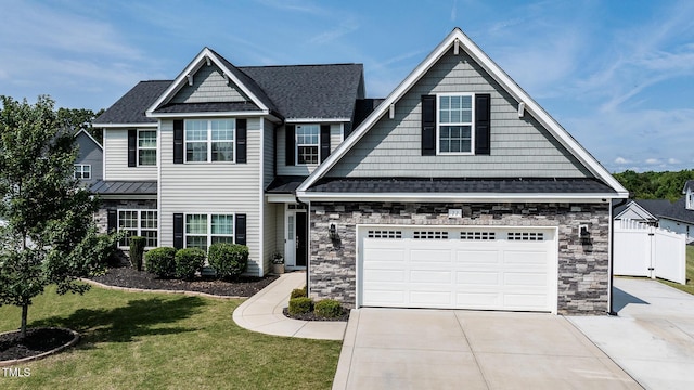 77 Redpine Ct, Clayton, NC 27520 - view of front of property featuring driveway, stone siding, and roof with shingles