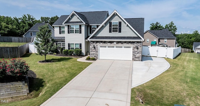 77 Redpine Ct, Clayton, NC 27520 - view of front of property featuring concrete driveway, a gate, stone siding, and an attached garage