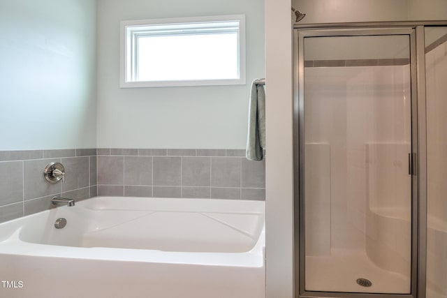 77 Redpine Ct, Clayton, NC 27520 - full bath with a shower stall and a bath
