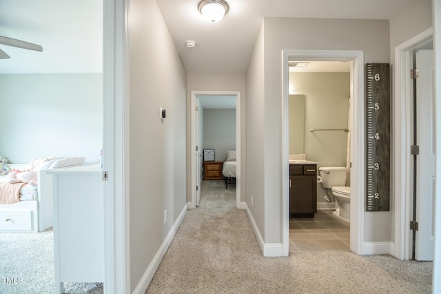 77 Redpine Ct, Clayton, NC 27520 - hall featuring light colored carpet and baseboards