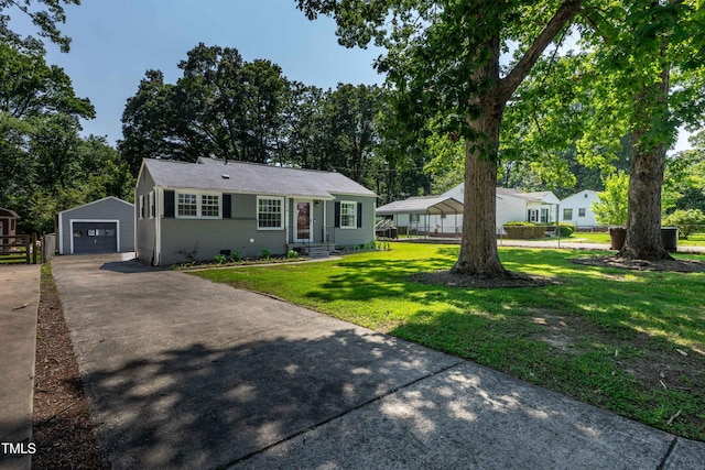 2719 Stratford Dr, Greensboro, NC 27408 - view of front of home with driveway, an outdoor structure, and a garage