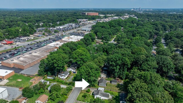 2719 Stratford Dr, Greensboro, NC 27408 - aerial view of property's location featuring a heavily wooded area