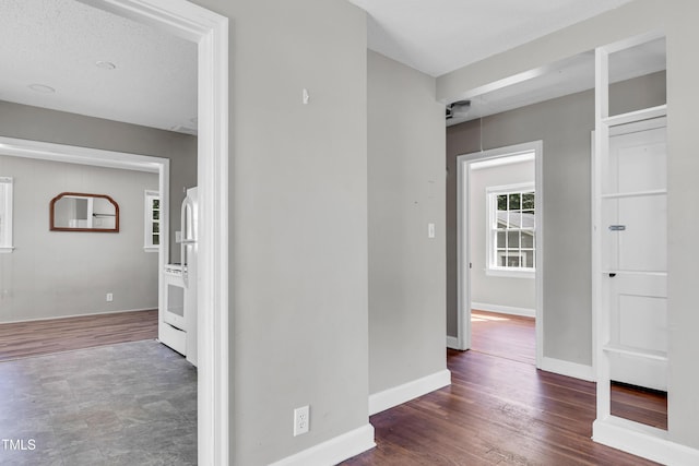 2719 Stratford Dr, Greensboro, NC 27408 - corridor featuring baseboards and wood finished floors