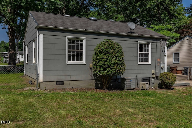 2719 Stratford Dr, Greensboro, NC 27408 - view of property exterior featuring crawl space, central AC, and roof with shingles