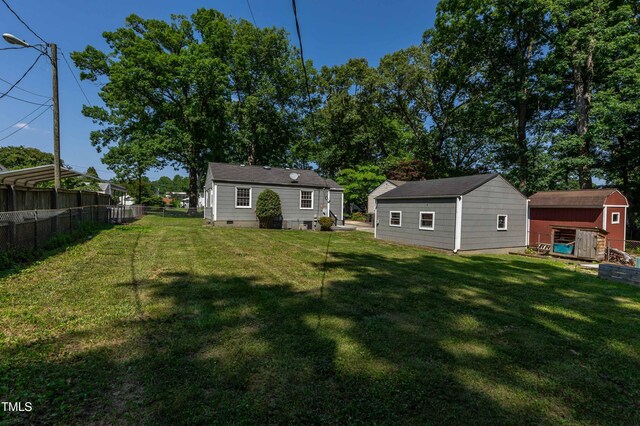 2719 Stratford Dr, Greensboro, NC 27408 - view of yard with an outdoor structure