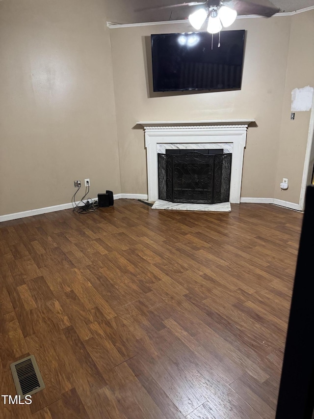 104 Holly Ranch Ct, Willow Springs, NC 27592 - unfurnished living room with a fireplace, wood finished floors, and a ceiling fan