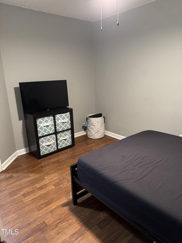 104 Holly Ranch Ct, Willow Springs, NC 27592 - bedroom featuring baseboards and wood finished floors