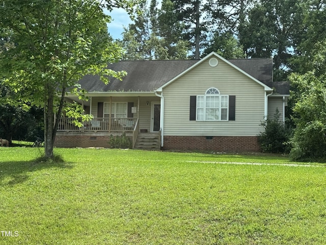 104 Holly Ranch Ct, Willow Springs, NC 27592 - single story home with crawl space, covered porch, a front lawn, and a shingled roof