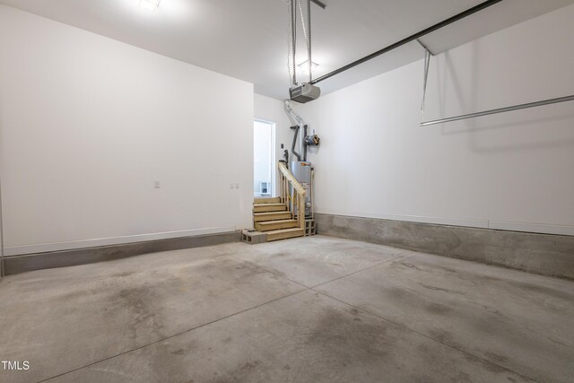 1217 Great Egret Way, Durham, NC 27713 - garage with a garage door opener and water heater
