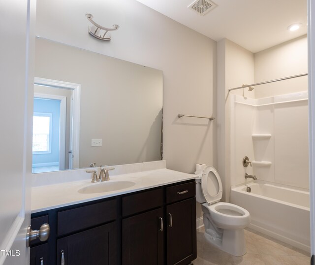 1217 Great Egret Way, Durham, NC 27713 - bathroom featuring vanity, toilet, tile patterned floors, and shower / bathtub combination