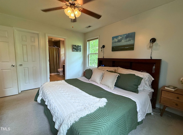 148 Langston Ridge Dr, Angier, NC 27501 - carpeted bedroom featuring ensuite bathroom and ceiling fan