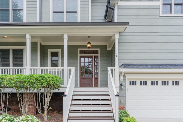 1138 Bexley Hills Bnd, Apex, NC 27502 - entrance to property with a garage and covered porch