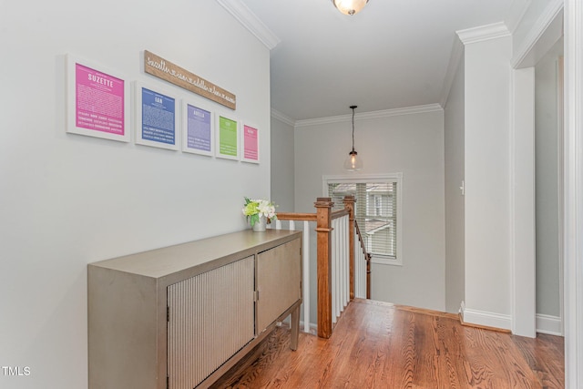 1138 Bexley Hills Bnd, Apex, NC 27502 - hall with an upstairs landing, crown molding, and light wood-style flooring